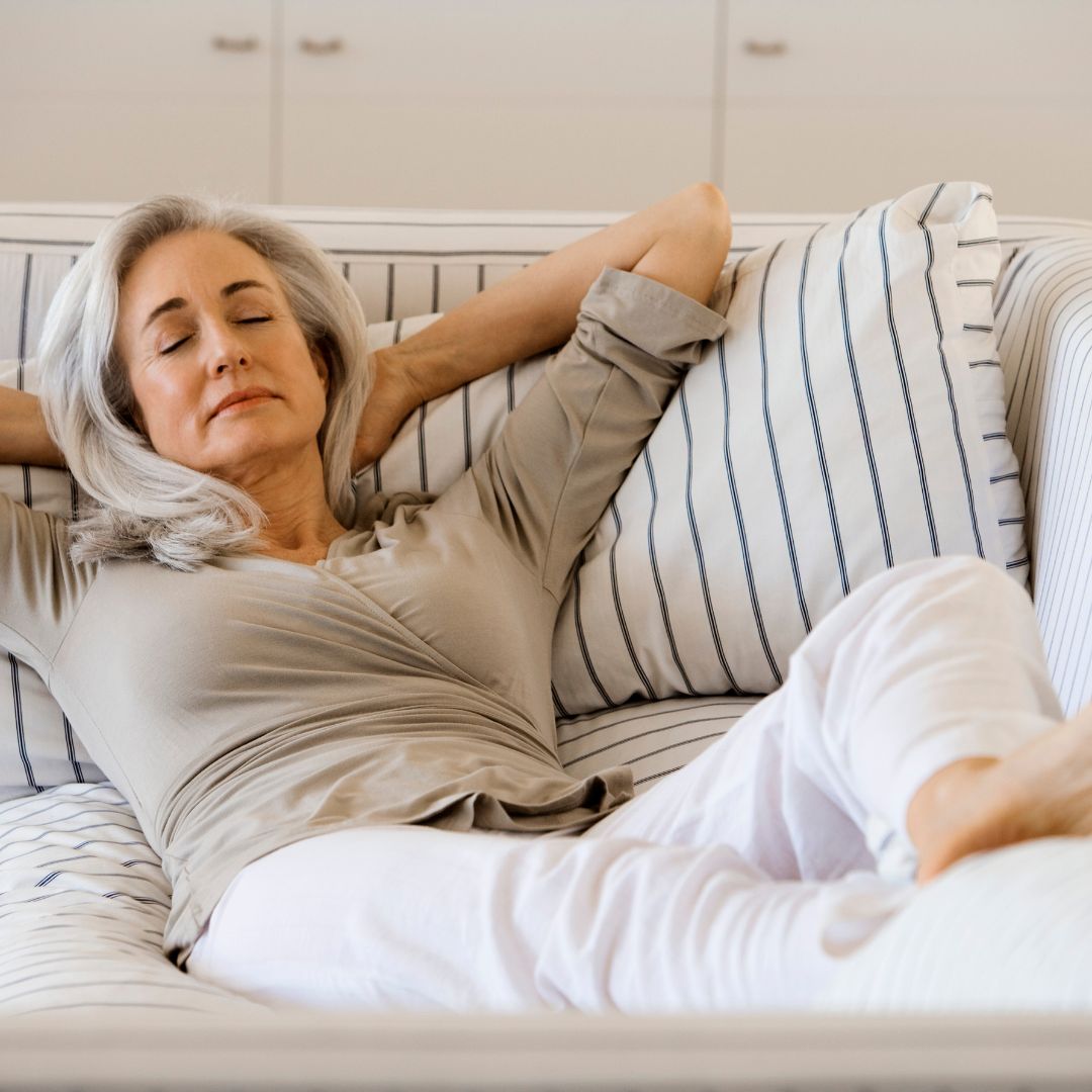 woman relaxing on sofa